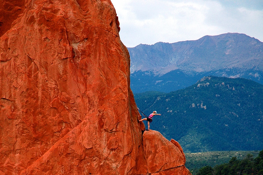 Girl rock climbing in Garden of the Gods park